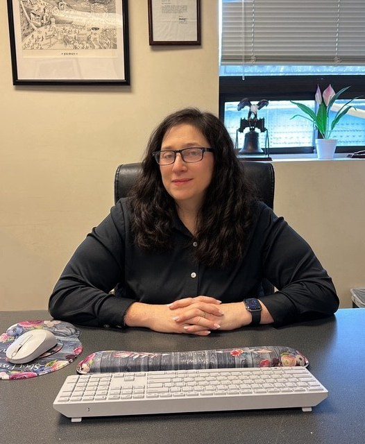 Office setting with woman at desk